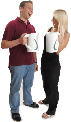 Photo of two tenants, each holding up a kettle